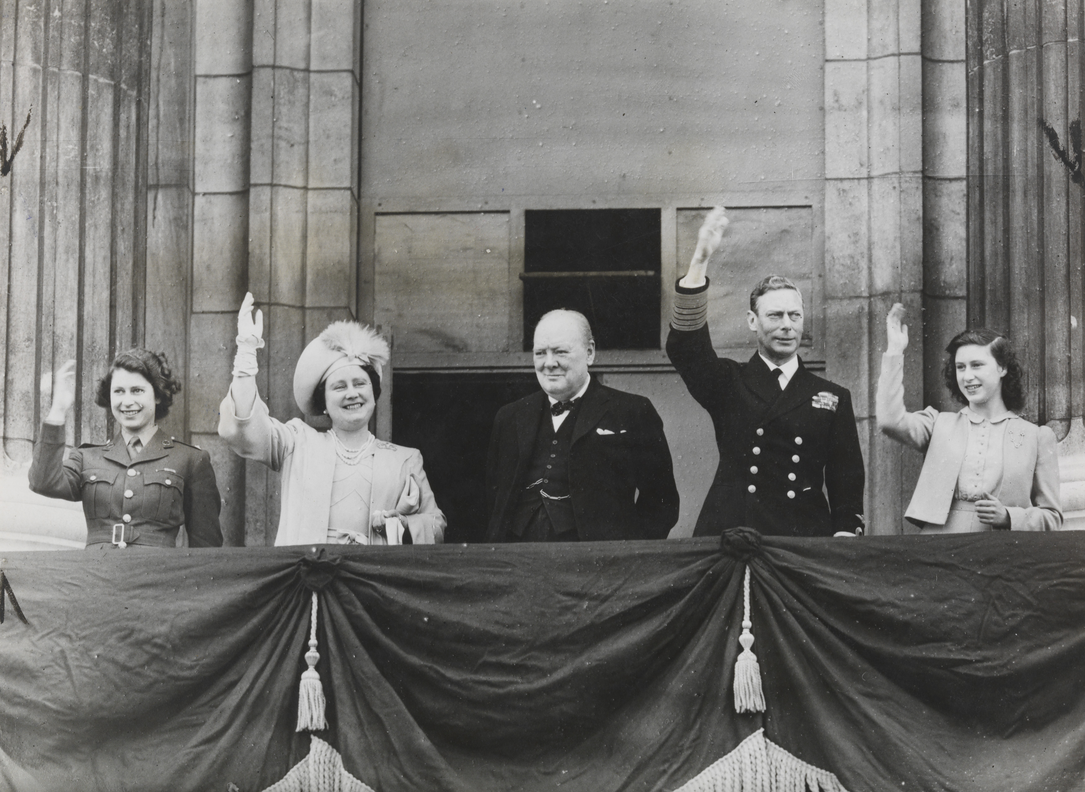 The Royal Family and Winston Churchill greet the people from Buckingham Palace balcony' 8th May 1945