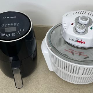 Image of air fryer and halogen oven on countertop during testing
