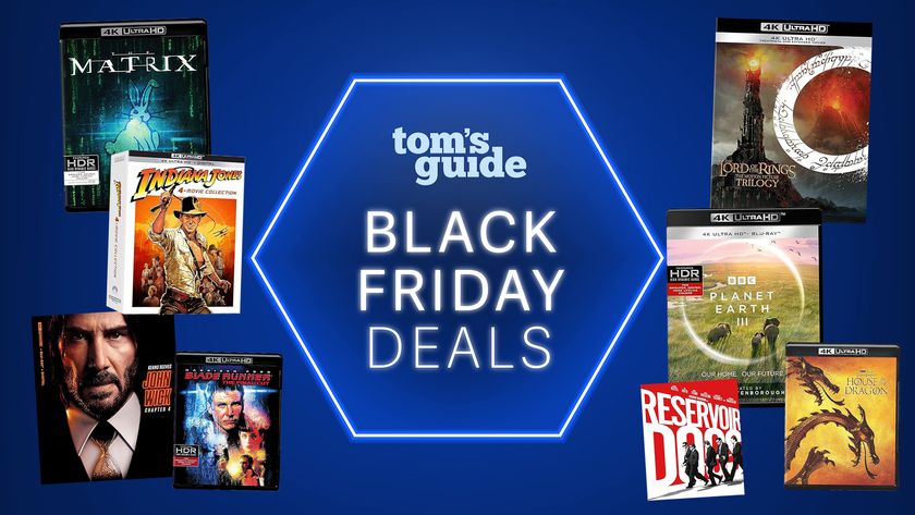 A blue Tom&#039;s Guide Black Friday image with several Blu-ray boxes on each side