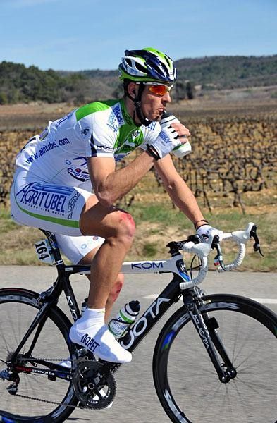 Ista is taking a drink to stay hydrated, which was vitally important on a hilly day.