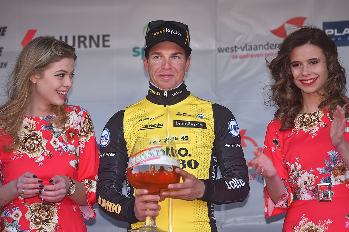 Dylan Groenewegen gets a beer for his victory