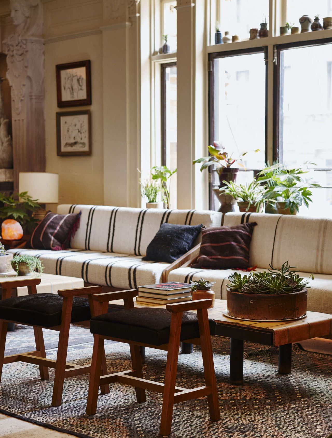 A nostalgically designed hotel fuses college dorm aesthetic with a mid-century furniture-led style.