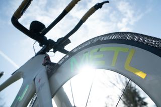 SMART tyre on a time trial bike with the sun shining through