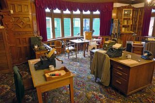 A look inside the Bletchley Park museum that shows desks and code-breaking machines
