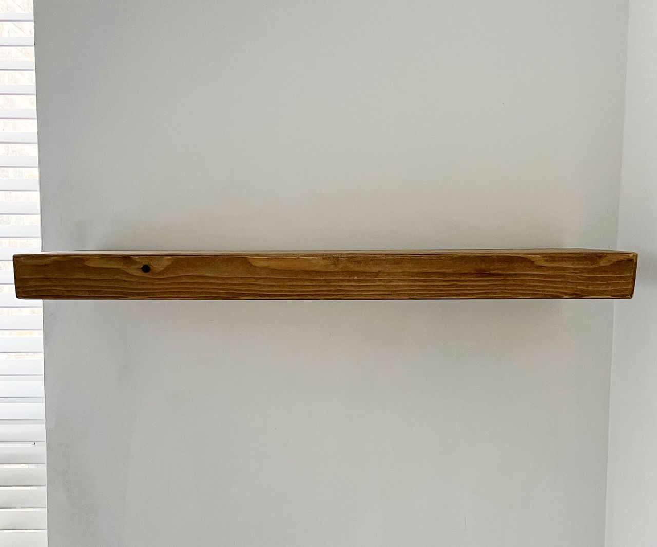 How to install a floating shelf | Real Homes