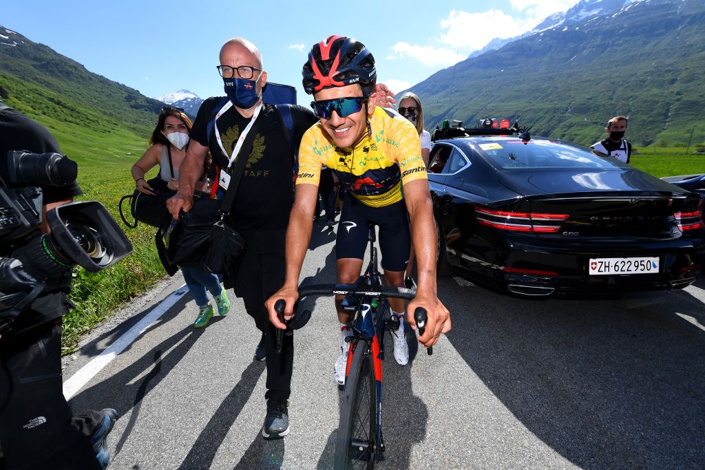 ANDERMATT SWITZERLAND JUNE 13 Richard Carapaz of Ecuador and Team INEOS Grenadiers yellow leader jersey celebrates at arrival during the 84th Tour de Suisse 2021 Stage 8 a 1595km stage from Andermatt to Andermatt Fans Public Children Flag UCIworldtour tds tourdesuisse on June 13 2021 in Andermatt Switzerland Photo by Tim de WaeleGetty Images