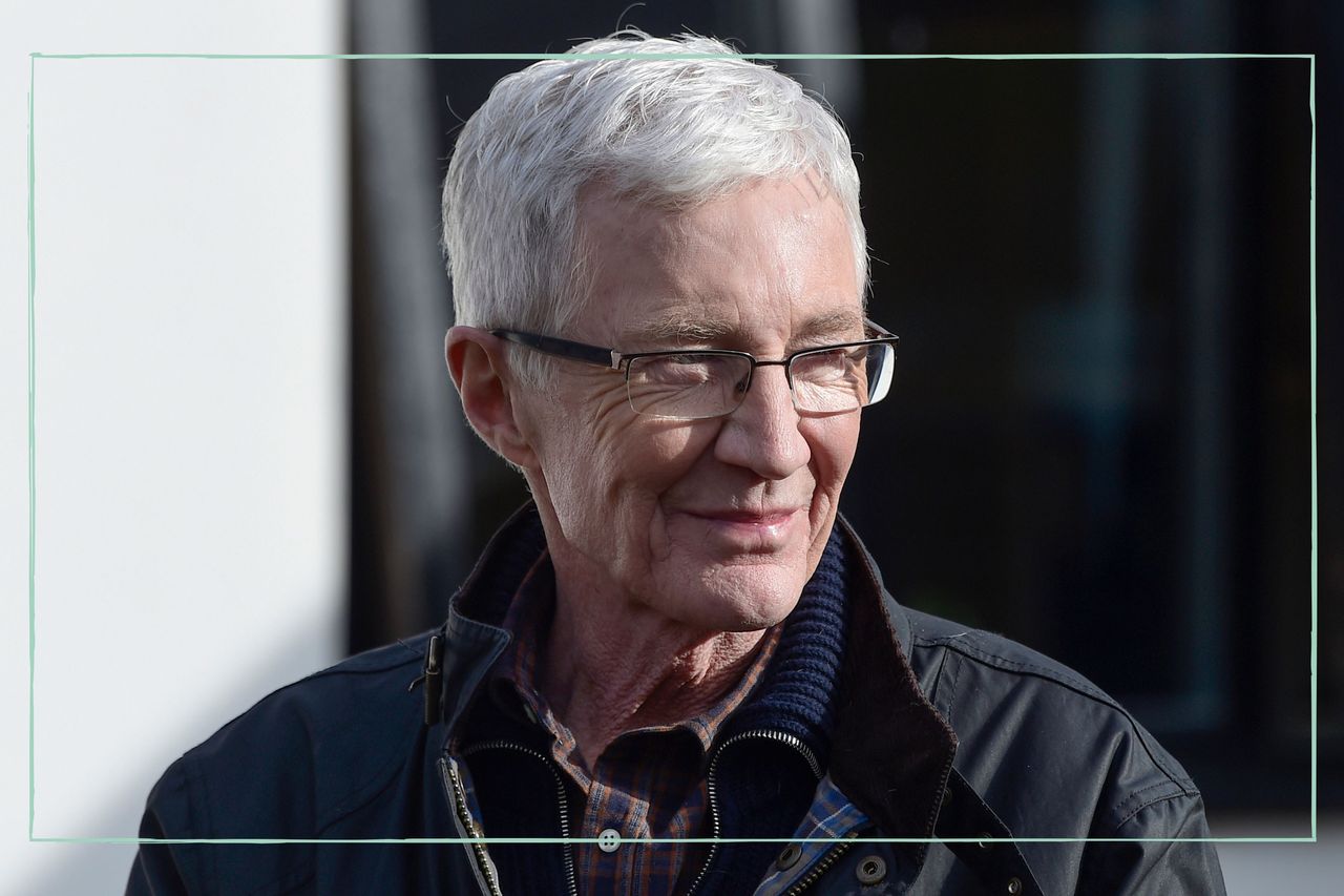 an extreme close up of Paul O&#039;Grady smiling and posing for the camera