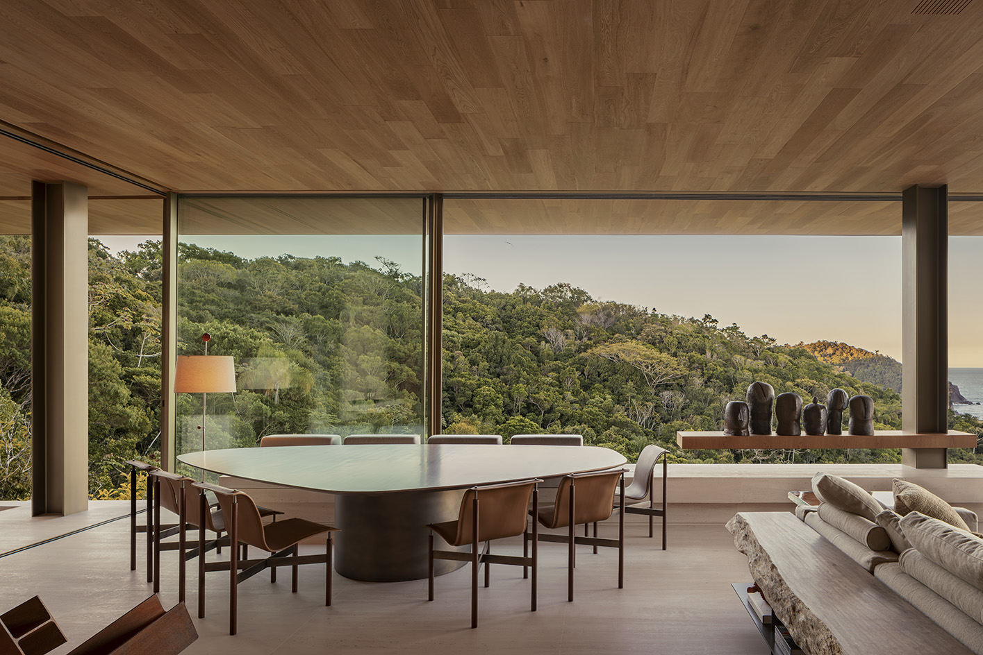 Bravissima House by Arthur Casas, a brazilian house nestled among the forest canopy and rising above the foliage to long views from large windows and ample terraces