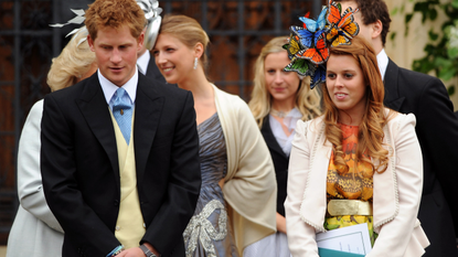 Prince Harry stands with cousin Princess Beatrice at the wedding of Peter Phillips to Autumn Kelly, at St George's Chapel in Windsor Castle on May 17, 2008 in Windsor, England.