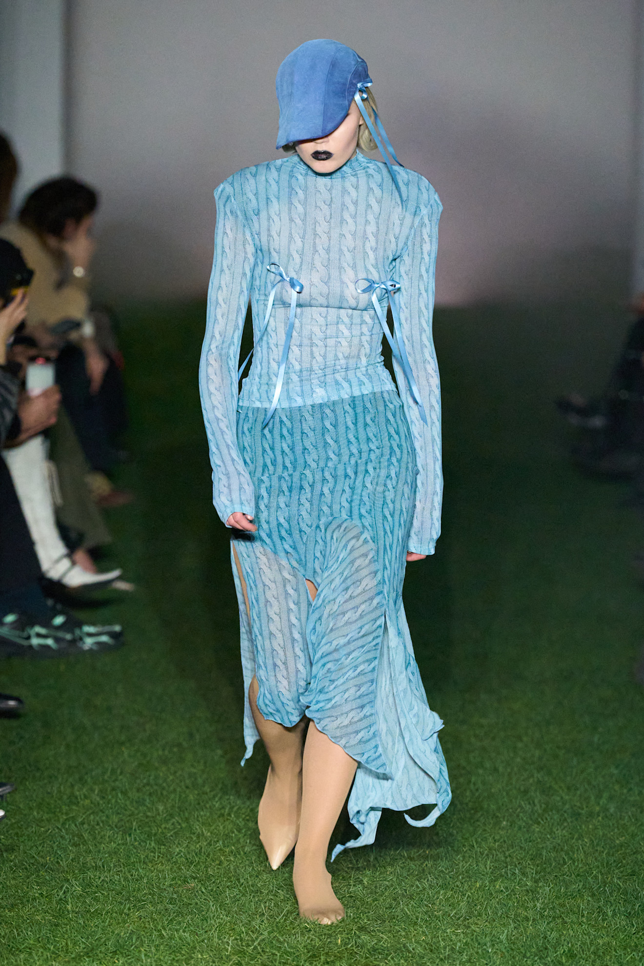 Model wears the baby blue color trend on the runway.