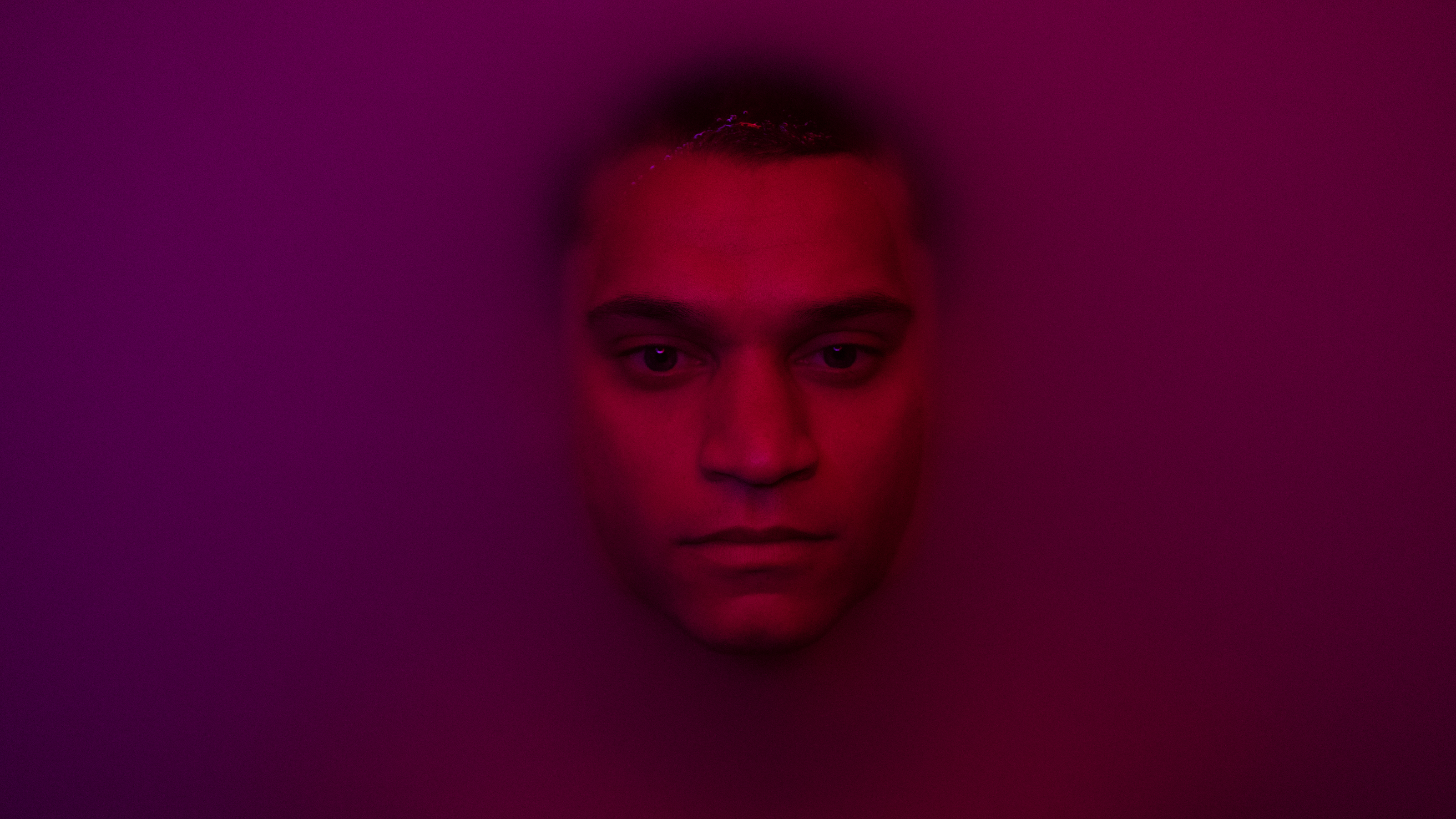 Quarterback Cameron Cade immersed in a liquid.