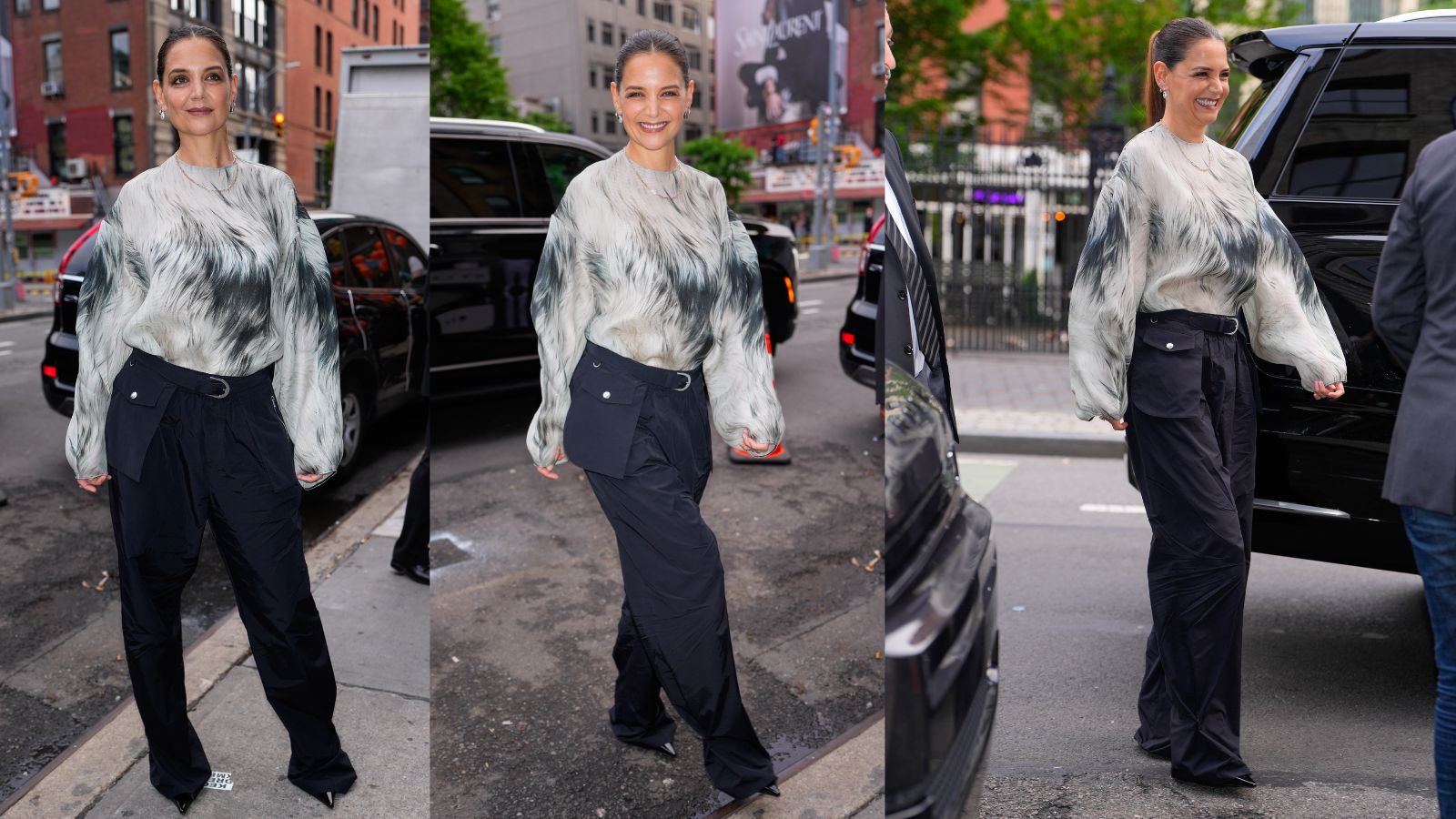 Katie Holmes in navy blue cargo pants nad feathery print top