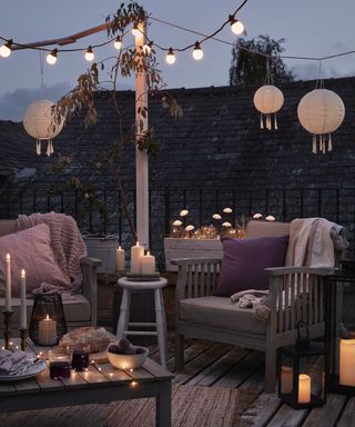 outdoor seating with layered lighting from Lights4fun