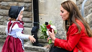 Catherine, Princess of Wales meets two-year-old Charlotte as she leaves St Thomas Church