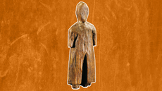 a wooden human figurine on an orange background