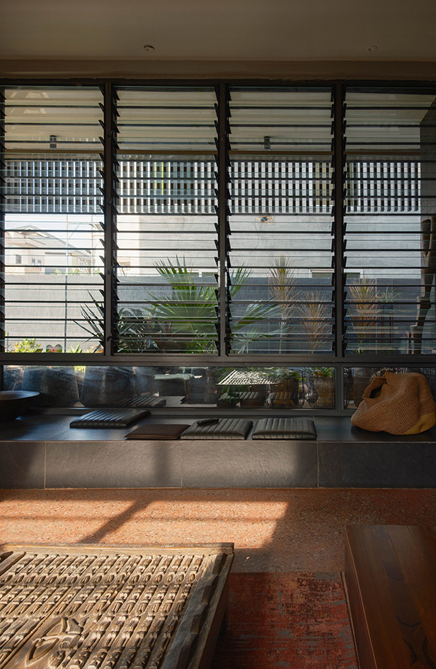 Compact House in Ghana, showing modern interiors and shades in a small but expansive-feeling space