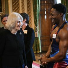 Queen Camilla meets one of the Gladiators