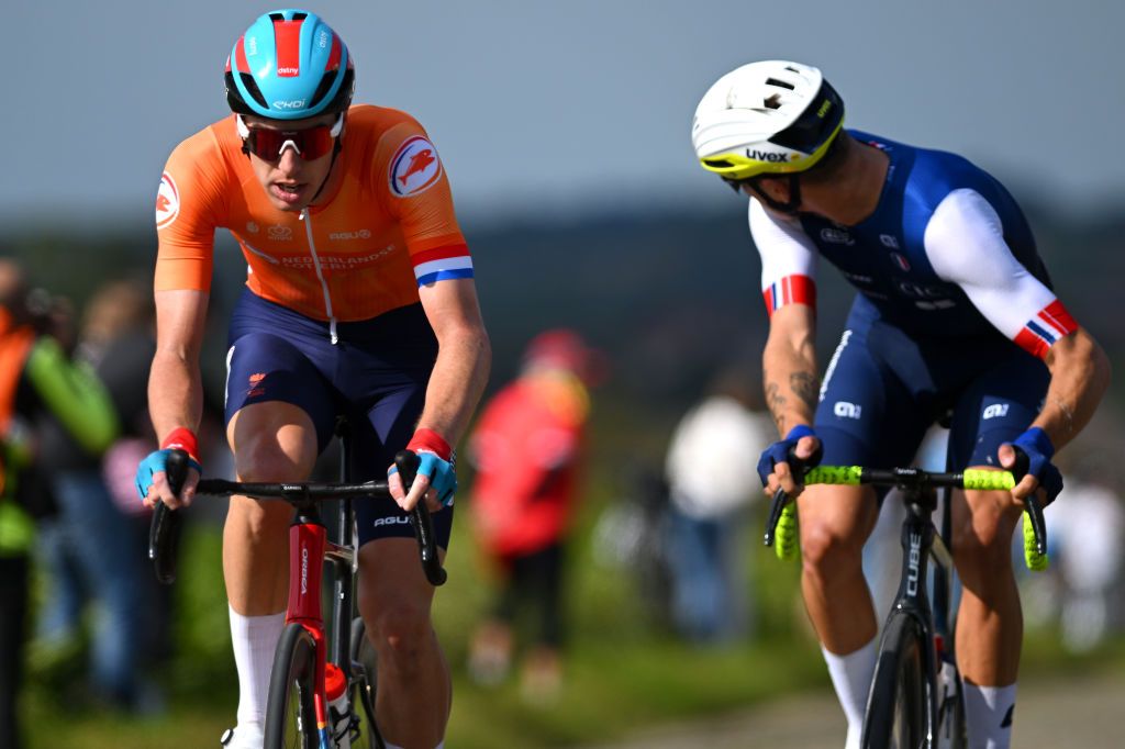 HASSELT BELGIUM SEPTEMBER 15 LR Pascal Eenkhoorn of Team Netherlands and Hugo Page of Team France compete during the 30th UEC Road Cycling European Championships 2024 Mens Elite Road Race a 2228km one day race from HeusdenZolder to Hasselt on September 15 2024 in Hasselt Belgium Photo by Luc ClaessenGetty Images