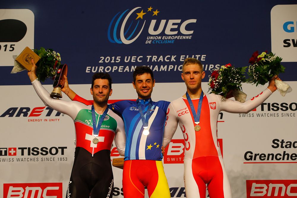 The men's scratch race podium: Marquet, Mora and Teklinski