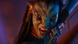 A Navi warrior baring their teeth in Avatar: Fire & Ash