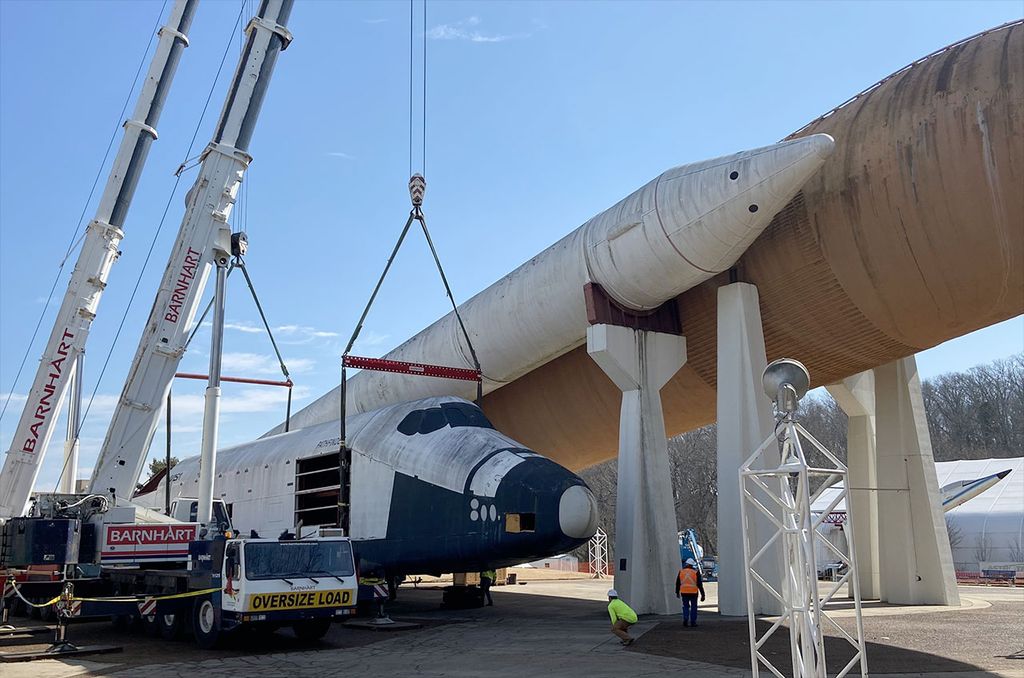 Mock space shuttle Pathfinder lowered to ground for first time in 30 years