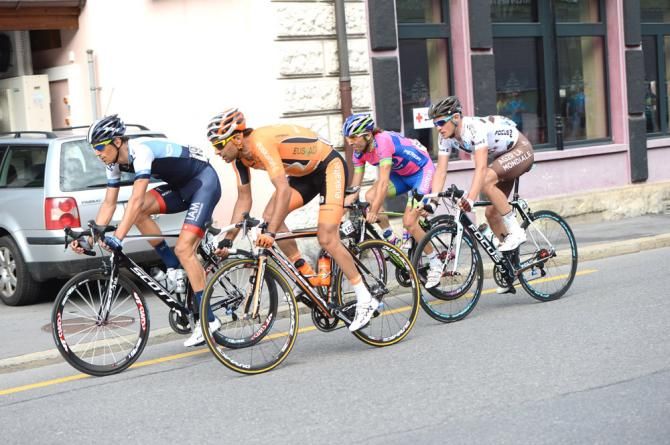 Reto Hollenstein (IAM Cycling) at the front of the early four-man escape