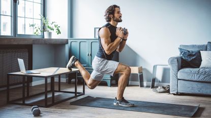 A man performing a leg workout at home