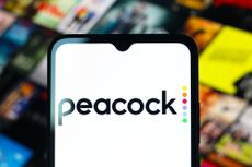 The Peacock logo on a phone.