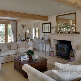 drawing room with sofaset and fireplace