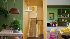 green dining area, yellow entryway and green living room