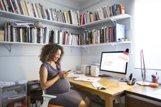 pregnant woman working from home