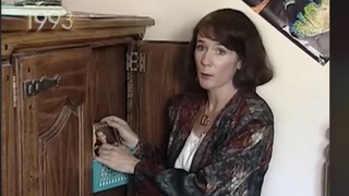 Pam holding a Michael Bolton album