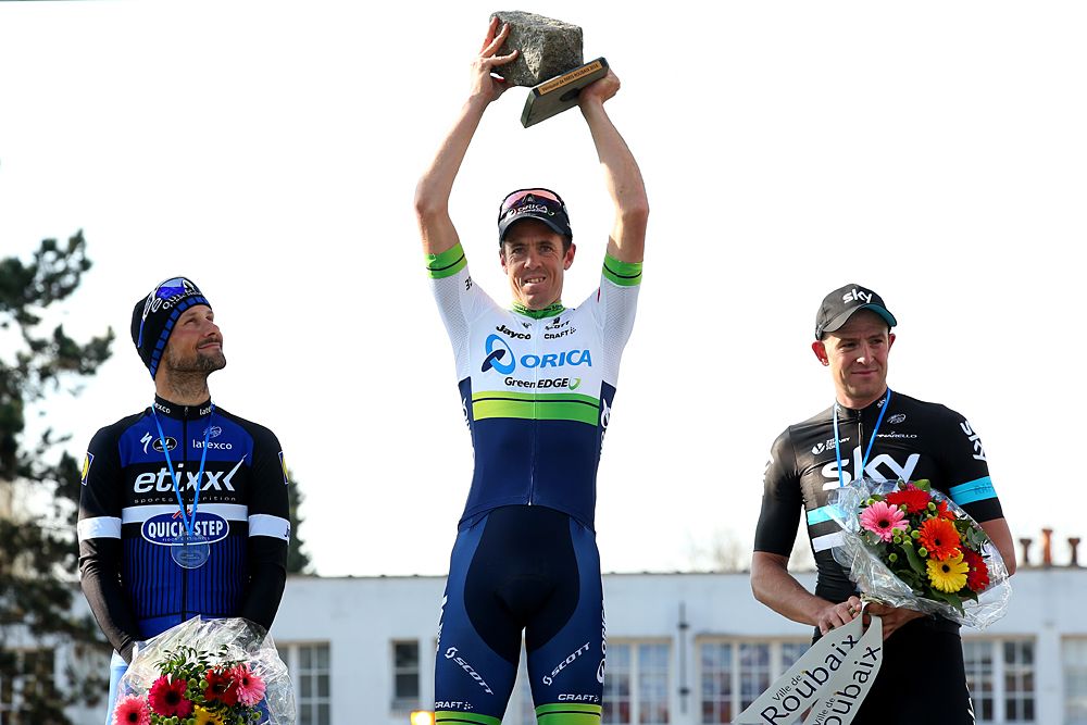 Matt hay man (Orica-GreenEdge) raises the Paris-Roubaix trophy in victory
