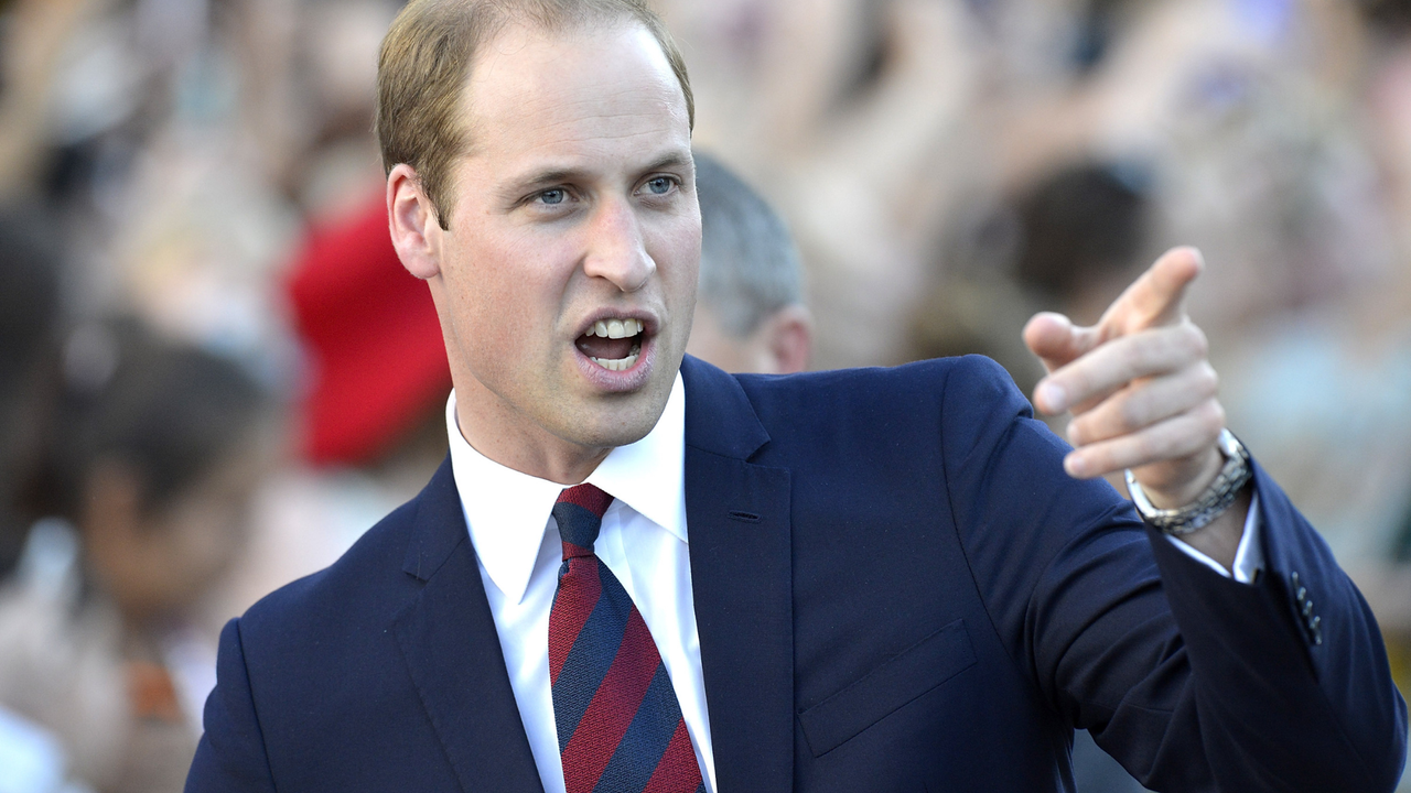 Prince William, Duke of Cambridge is seen pointing to something in the crowd on April 19, 2014 in Brisbane, Australia.