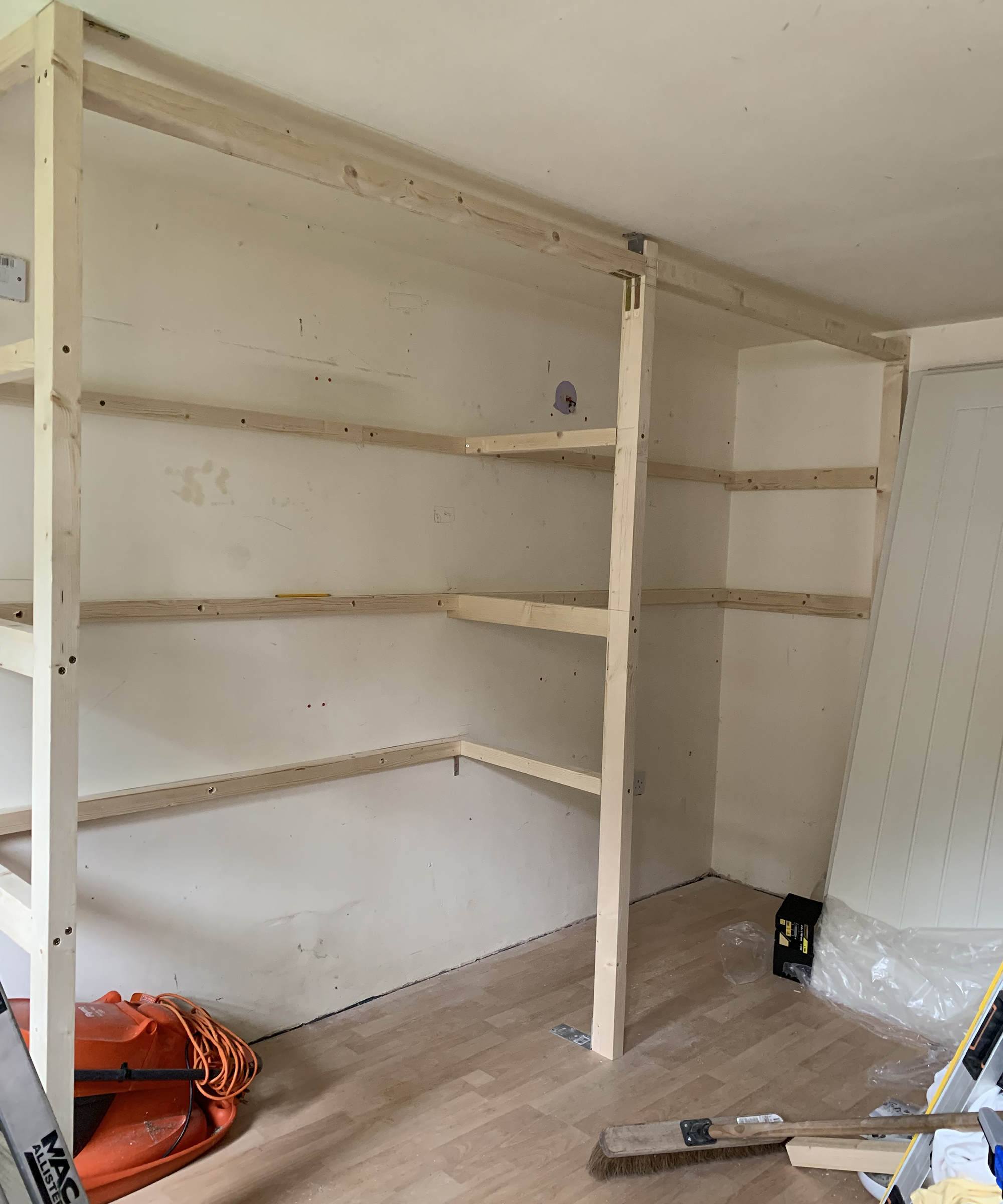 Wooden shelf frames for garden outbuilding
