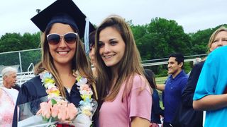 Taylor with her sister at her sister's graduation.