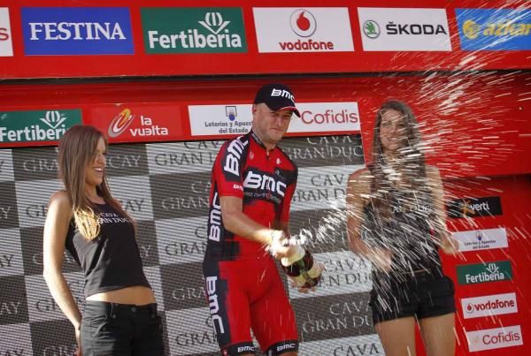 Steve Cummings (BMC) celebrates atop the podium.