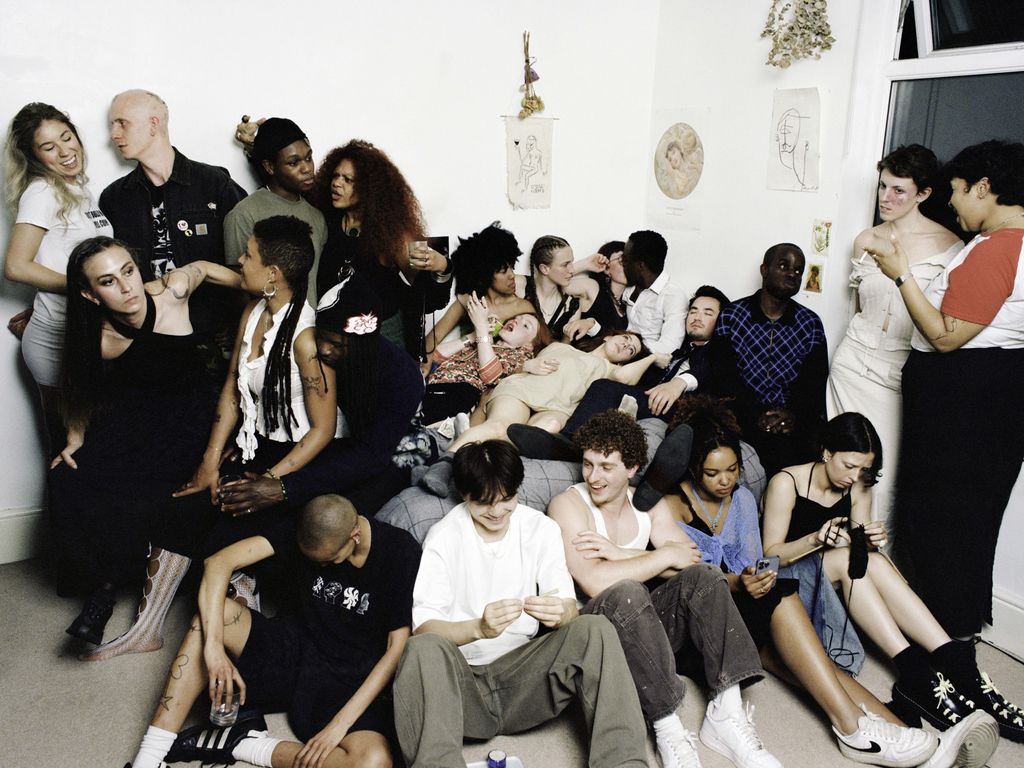 Group of people sitting and standing 