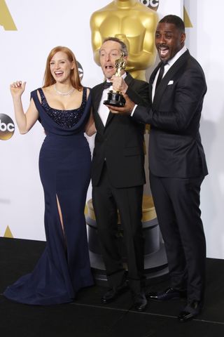 Jessica Chastain, Emmanuel Lubezki and Idris Elba At The Oscars, 2015