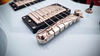 Epiphone Power Players SG review: Close up of Epiphone Power Players SG bridge and pickups