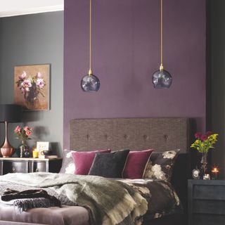 pendants over bed in a purple bedroom
