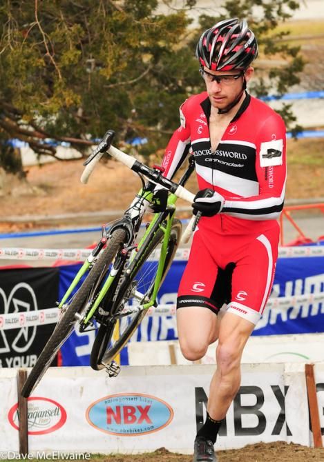 Shawn Milne (Cyclocrossworld.com) leading over the barriers