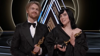 Billie Eilish and Finneas O'Connell accepting Oscar for No Time To Die 2022 Oscars
