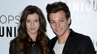 Louis Tomlinson and Eleanor Calder on red carpet