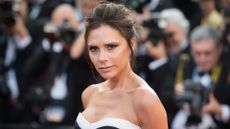 Victoria Beckham's favourite perfume - Victoria Beckham wears a black and white gown as she attends the screening of "Cafe Society" at the opening gala of the annual 69th Cannes Film Festival at Palais des Festivals on May 11, 2016 in Cannes, France. 