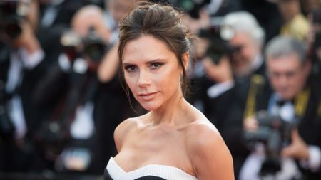 Victoria Beckham's favourite perfume - Victoria Beckham wears a black and white gown as she attends the screening of "Cafe Society" at the opening gala of the annual 69th Cannes Film Festival at Palais des Festivals on May 11, 2016 in Cannes, France. 