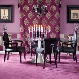 purple dining room with carpet and table