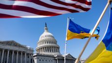 U.S. and Ukraine flags fly outside U.S. Capitol as House votes on aid