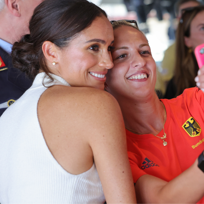 Meghan, Duchess of Sussex takes selfies with Invictus athletes during the Invictus Games Dusseldorf 2023 - One Year To Go events, on September 06, 2022 in Dusseldorf, Germany