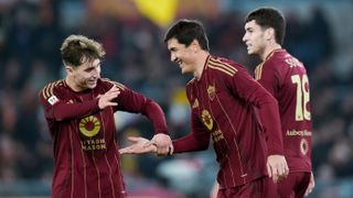 Eldor Shomurodov of AS Roma celebrates with Tommaso Baldanzi after scoring fourth goal during the Coppa Italia match between AS Roma and UC Sampdoria 